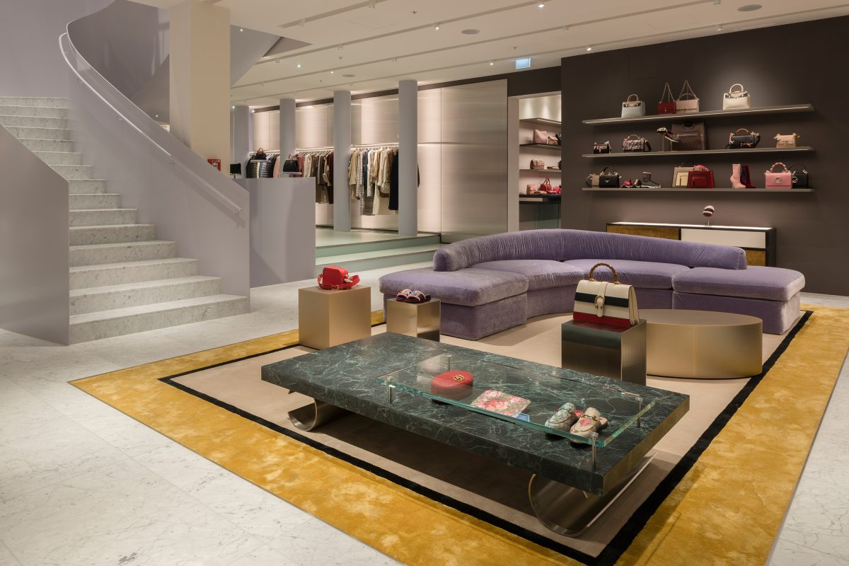 Mytheresa Store München sofa Tisch treppe regal showroom