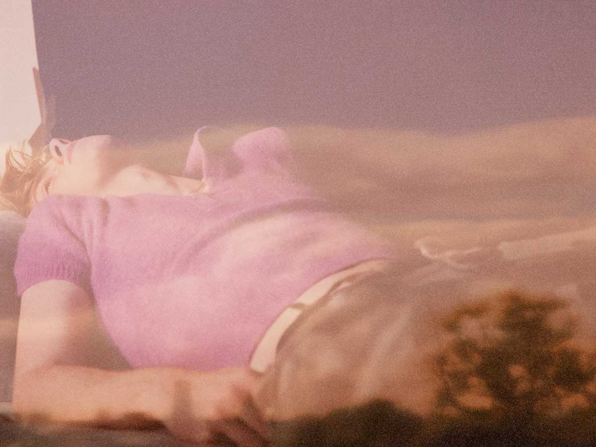rimowa pride and commerce pink person sky clouds