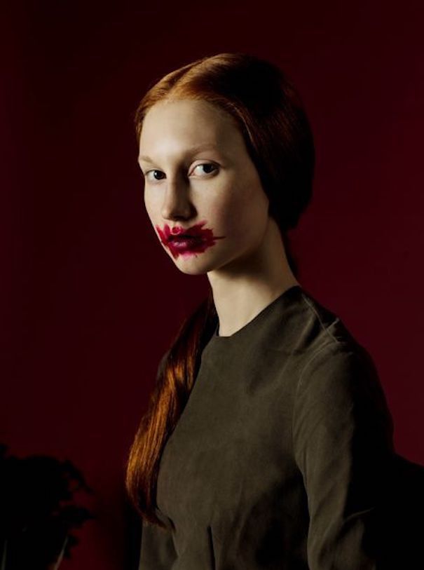 dima and galia brown hair woman red background smudged lipstick