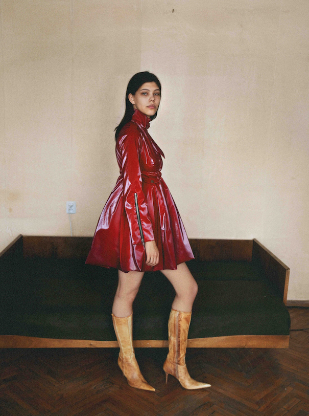 Anton Belinskiy Ukraine Black couch Model red dress gold boots