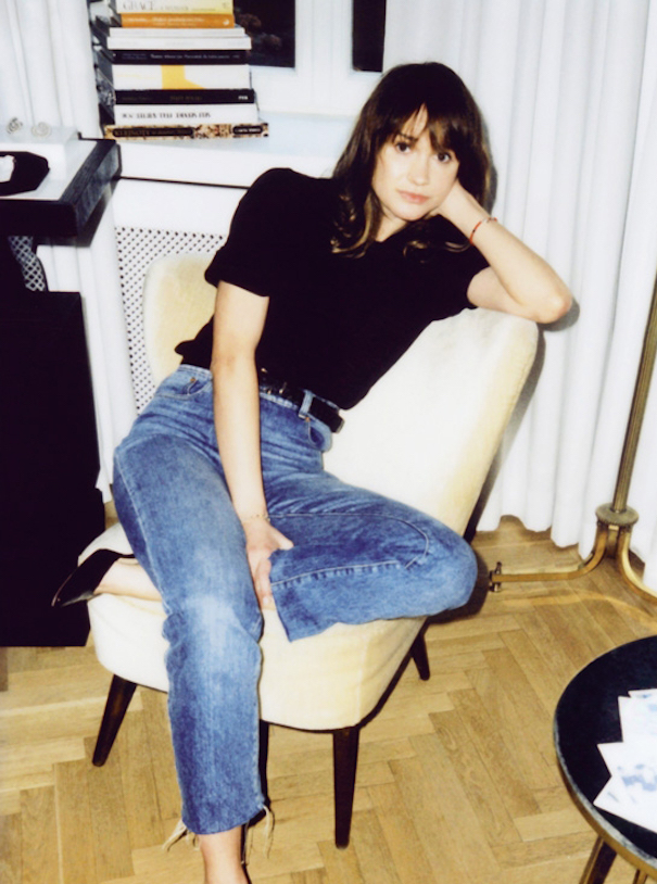 Magda Butrym Poland Portrait Jeans Black t Shirt white chair