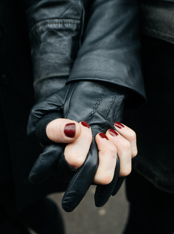 Berlin wears black black jacket nails