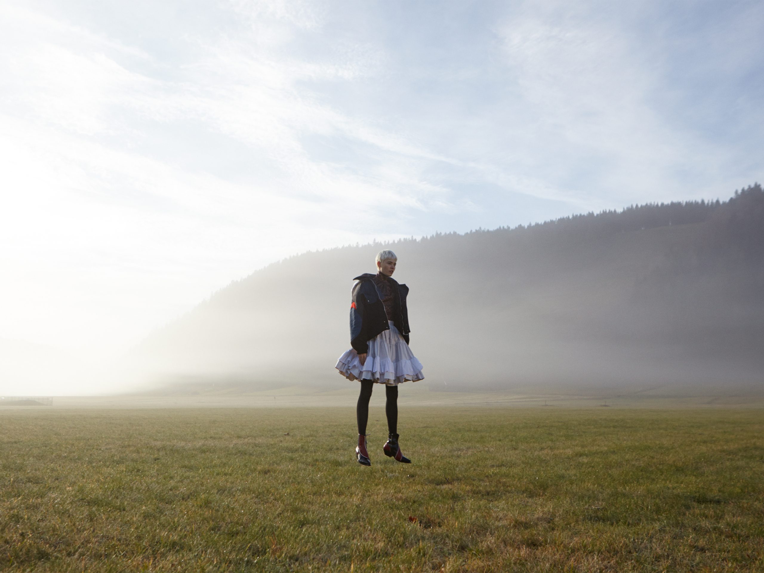of fog and falls jumping into the fog Maike in Black Forest Louis Vuitton