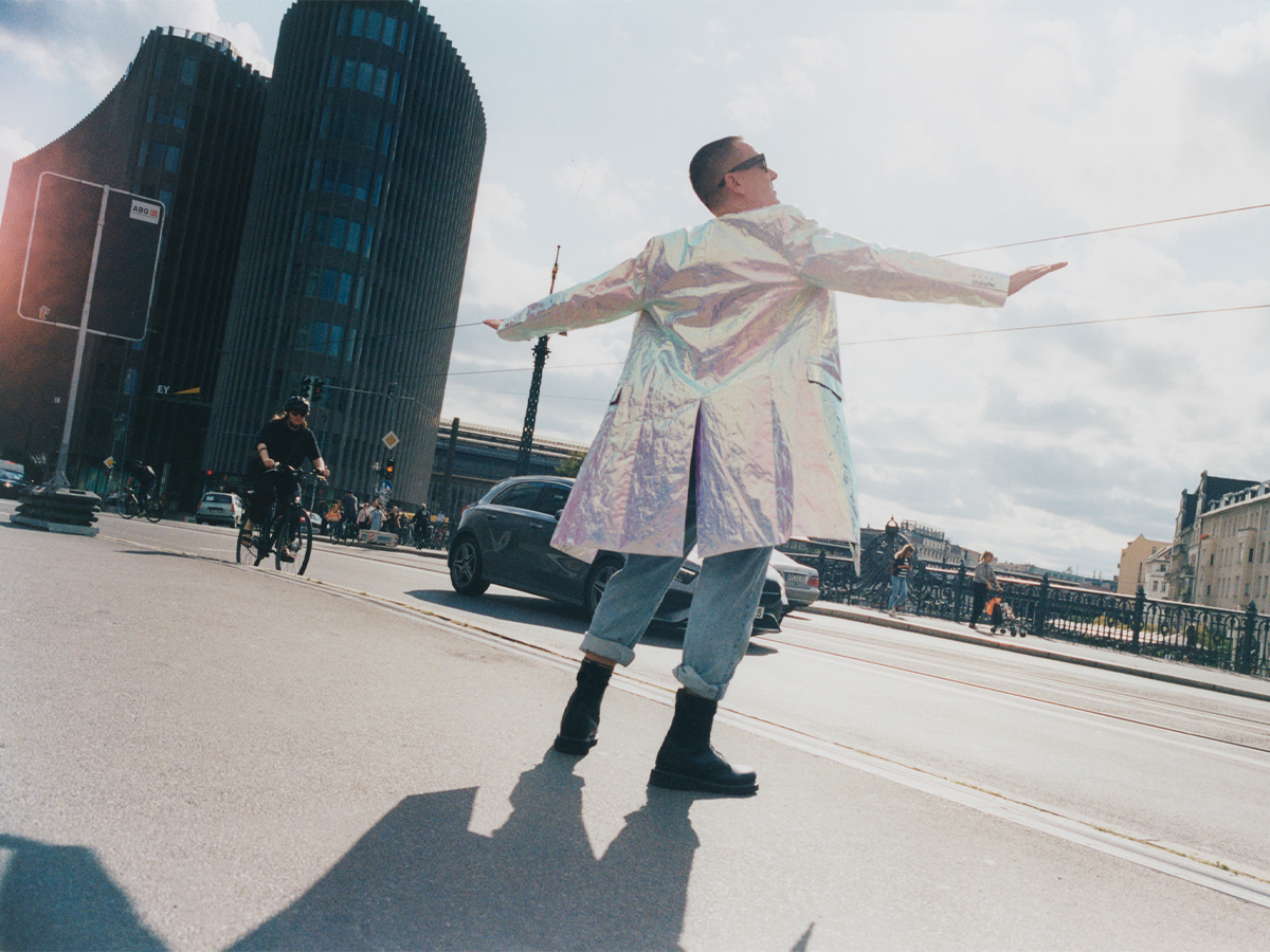 Jeremy Scott is wearing an archival Moschino coat