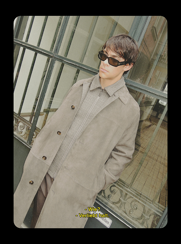 Model wearing coat, jacket, pants and eyewear TOD'S