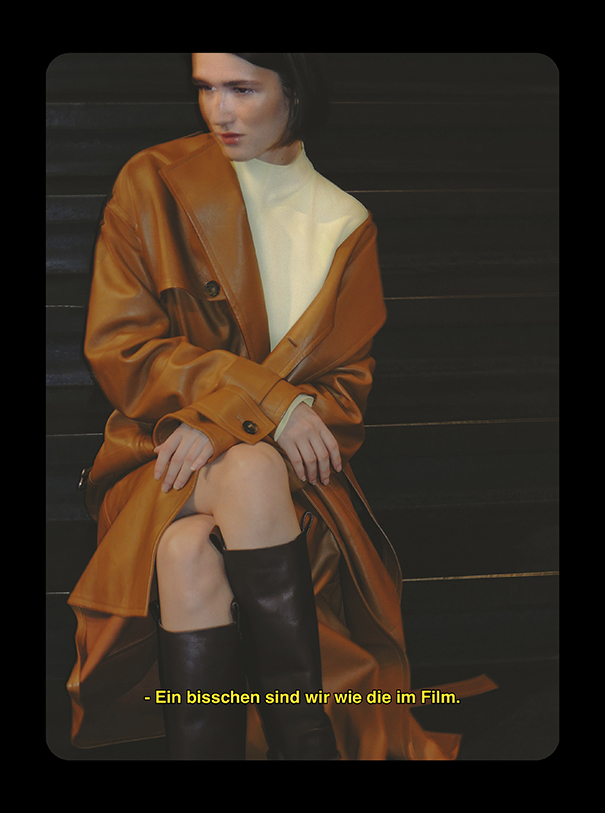 Model wearing coat, top and boots TOD'S