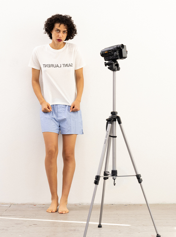 Charlotte Nolting/Modelwerk is wearing dress ISSEY MIYAKE, shoes BALENCIAGA and Seamaster Aqua Terra 150M watch OMEGA