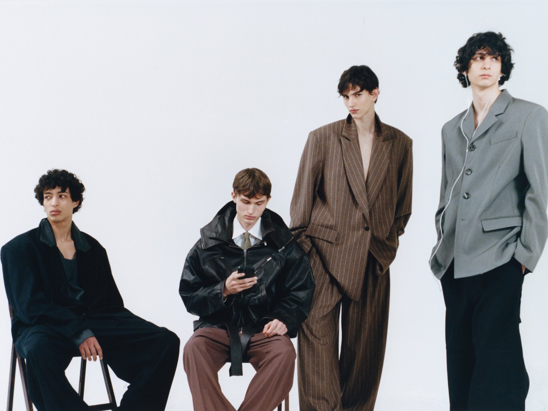 Four male models in a Paris studio for ACHTUNG 51