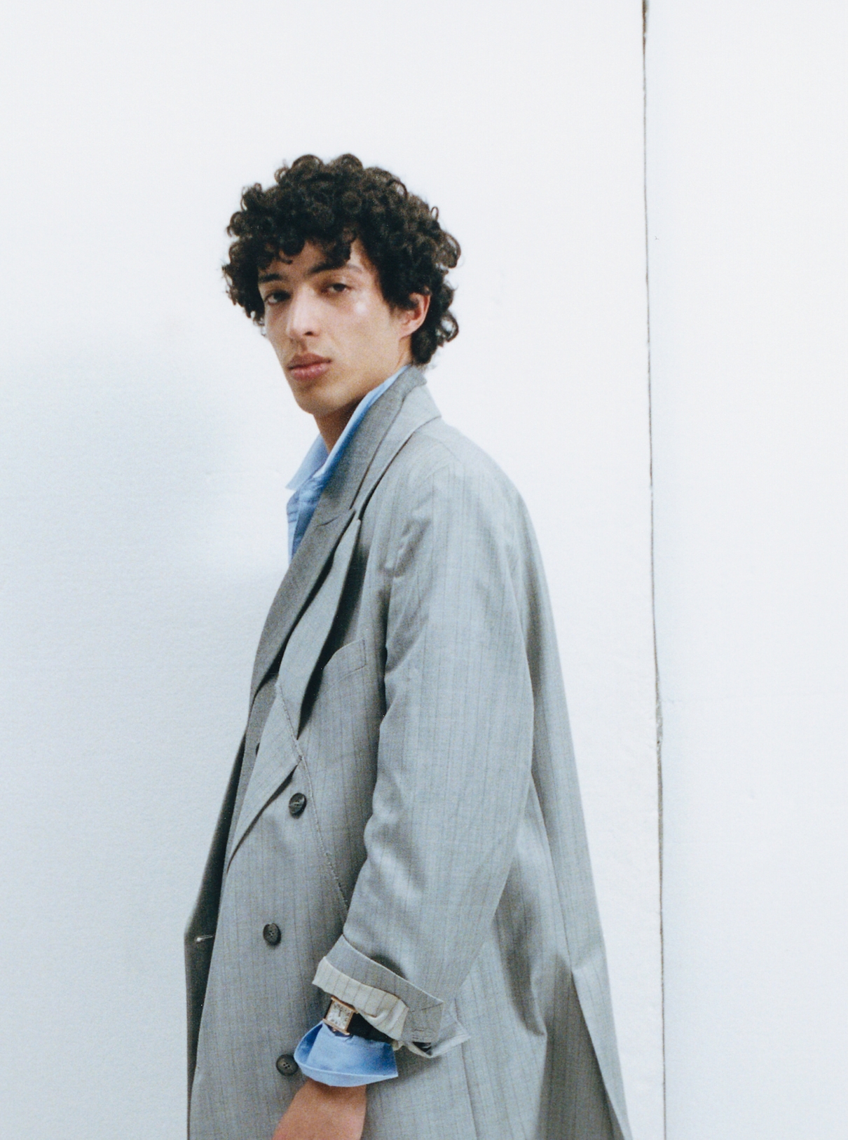 Jackets MOOHONG; Blue shirt COMME DES GARÇONS SHIRT; Watch CARTIER