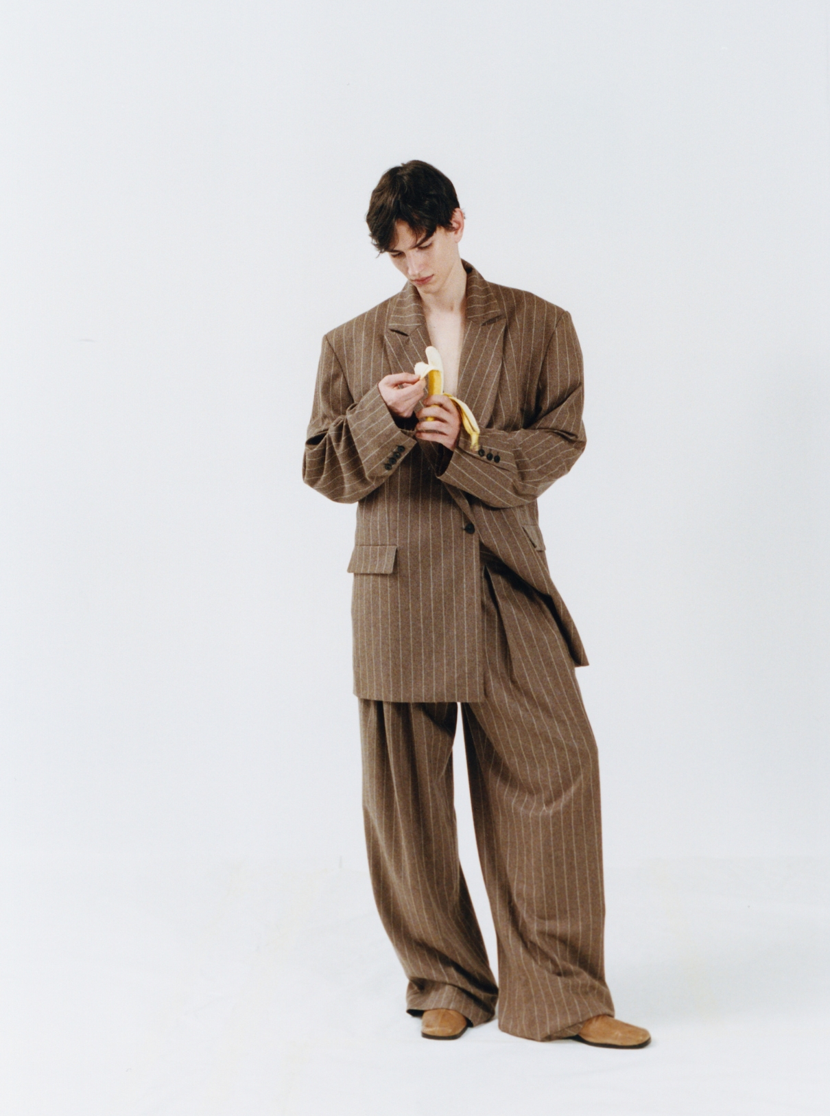 Male model behind the scenes wearing total look GAL NELL DAHAN