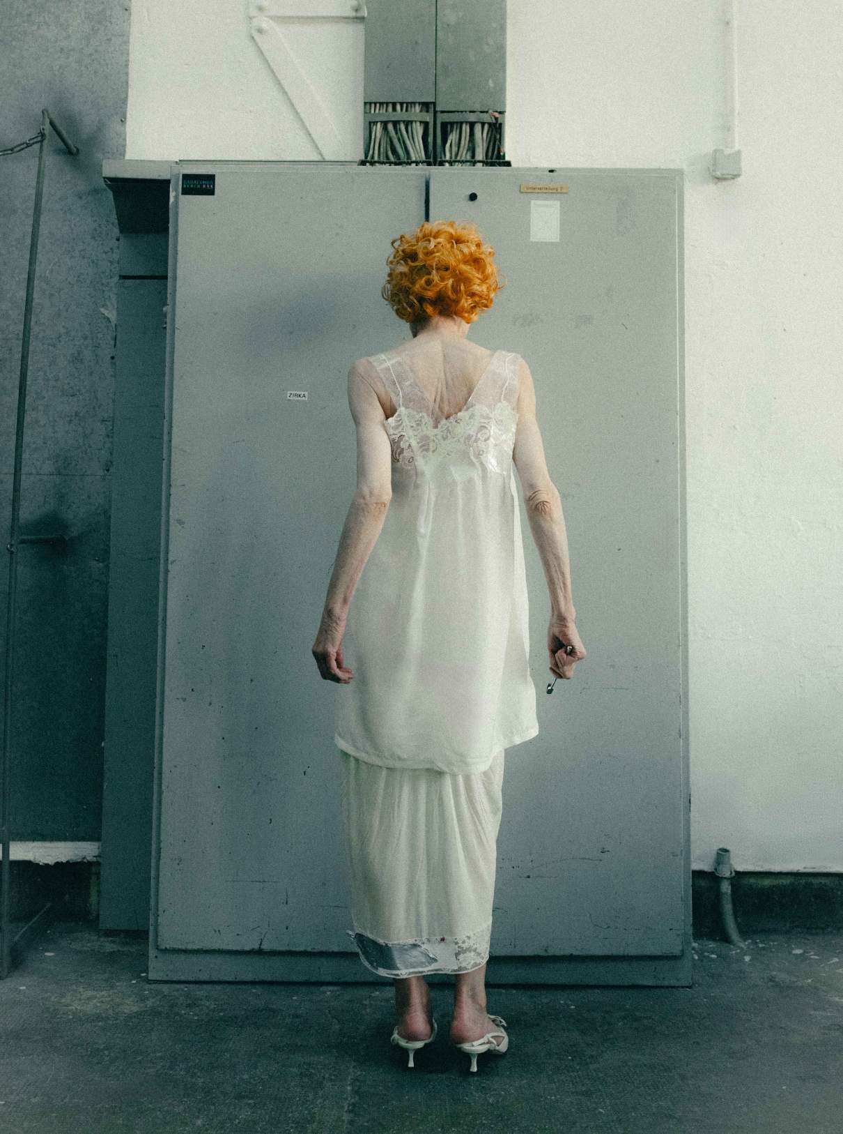 Dress MAISON MARGIELA; Shoes JIMMY CHOO